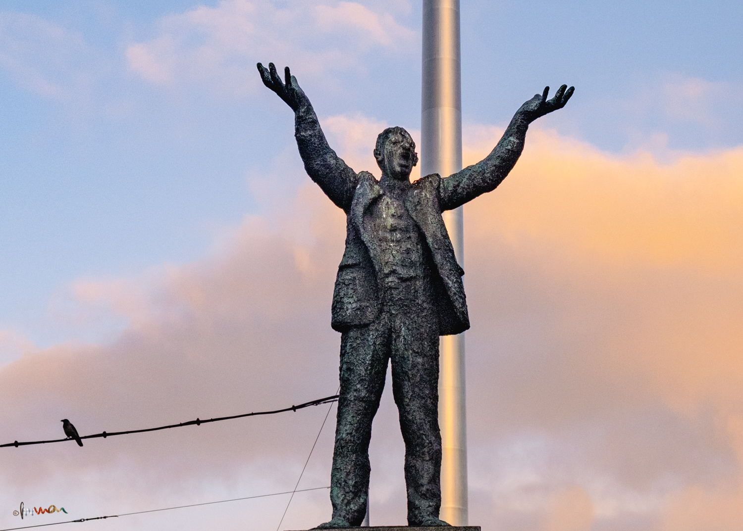 Jim Larkin Statue by Oisín Kelly, 1978. The Spire of Dublin by Ian Ritchie Architects, 2002/3. Arms open. Traduced. Where is Nelson's Pillar? No Monument Creamery either. Just a lone crow.