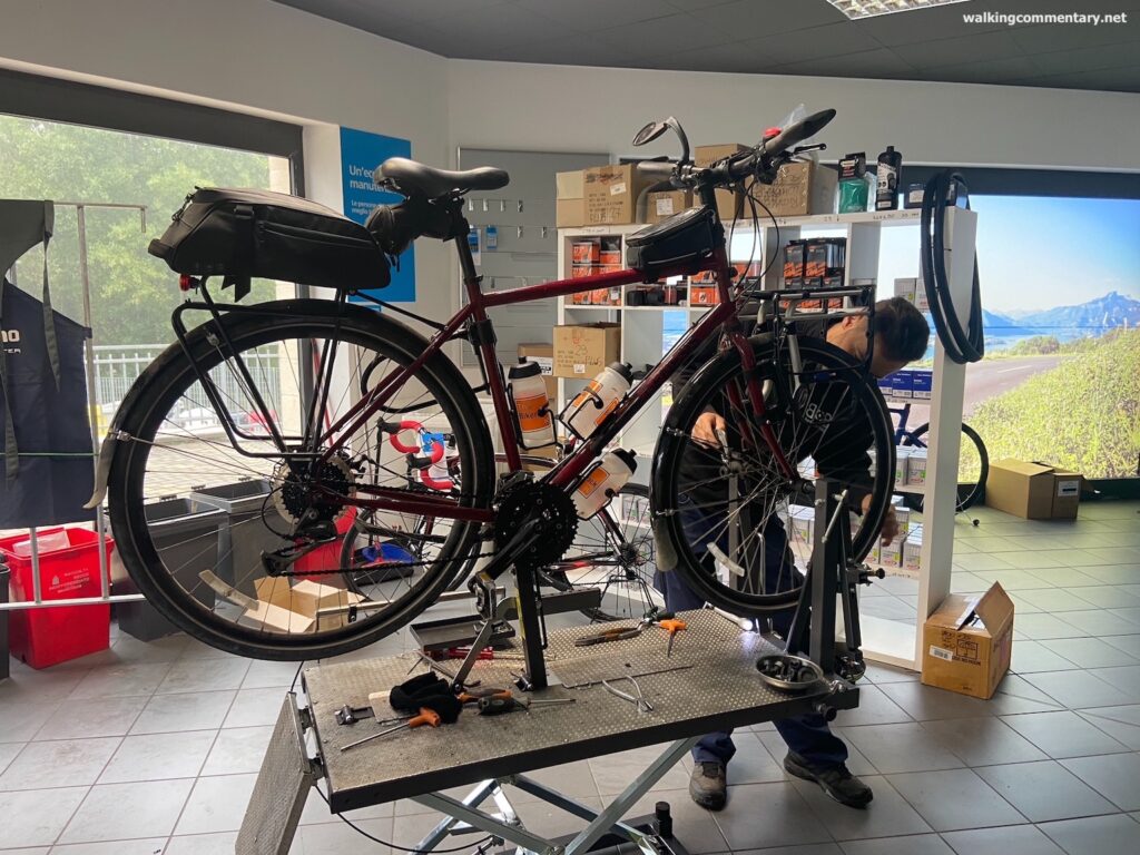 Day 23: Aulla to Pisa - bike being serviced in shop