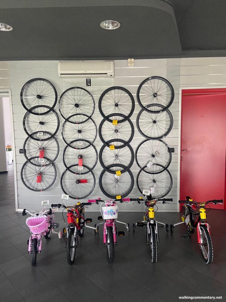 Day 23: Aulla to Pisa - wheels and children's bikes in shop