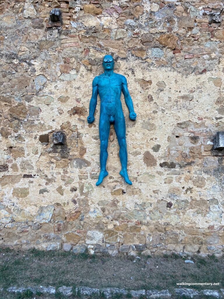 Day 27: Slog - blue man statue on a wall
