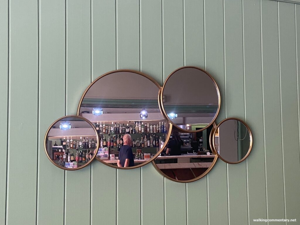 interesting mirrors on a wall